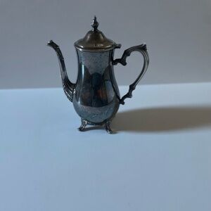Beautiful silver plated tea pot.